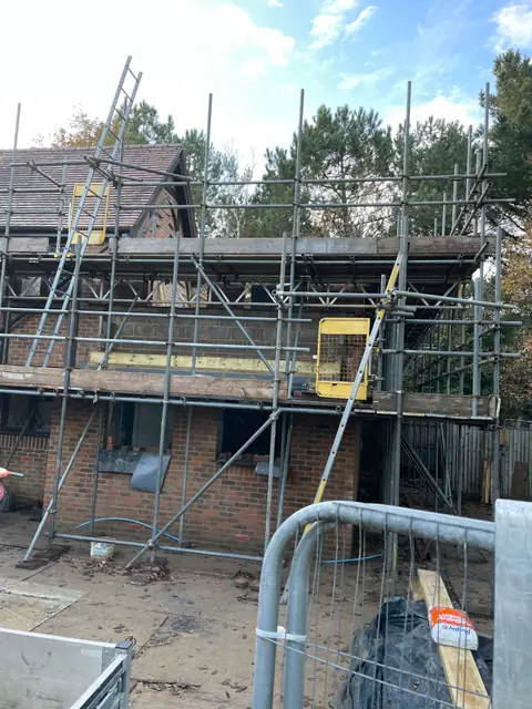 The extension wrapped in scaffolding at first floor level
