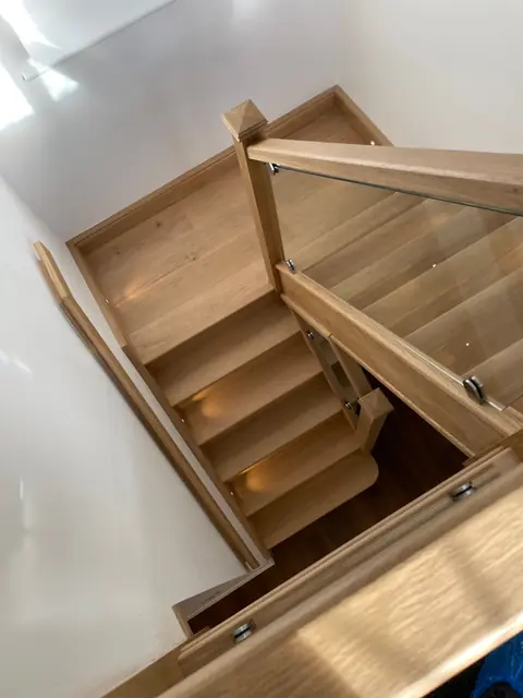 Looking down the new oak and glass staircase